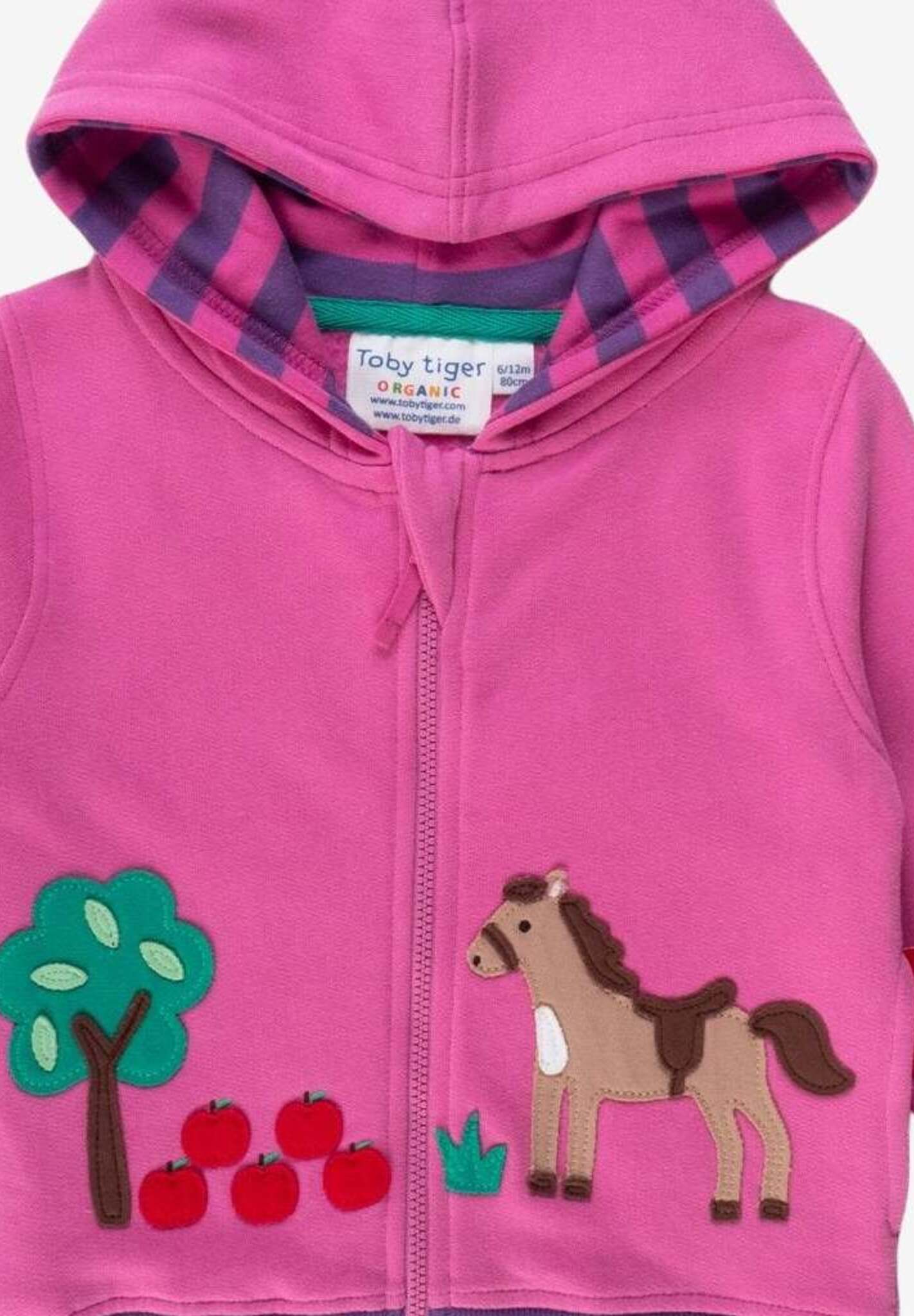 Premium kids hoodie with playful horse embroidery, organic cotton, soft striped lining, bright pink and purple, cozy pullover by Toby Tiger at brixbailey.com