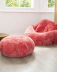 Hot Buns sheepskin pouffe, Icelandic shorn fur floor cushion, luxury 50mm sheepskin, stylish low riding pouffe, best-selling comfy footrest by Wildash London at brixbailey.com