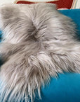 Luxury Icelandic sheepskin throw in dove grey, premium long-haired ethically sourced sheepskin rug, best-selling sustainable home decor by Wildash London at brixbailey.com