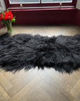 Luxury Icelandic sheepskin rug, premium long fur black runner, double back to back, 100% natural, handcrafted, best-selling home decor by Wildash London at brixbailey.com