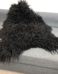 Premium Icelandic sheepskin rug, natural black, long curly hypoallergenic fur, ethically sourced, luxury free-range sheepskin throw by Wildash London at brixbailey.com