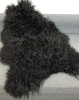Premium Icelandic sheepskin rug, natural black, long curly hypoallergenic fur, luxury free-range ethically sourced hide by Wildash London at brixbailey.com