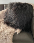 Luxury Icelandic sheepskin cushion, natural black double-sided, premium long fur, handcrafted sustainable home decor by Wildash London at brixbailey.com