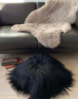 Luxury Icelandic sheepskin cushion, natural black, double-sided, premium long fur, handcrafted, sustainable, best-selling home decor by Wildash London at brixbailey.com