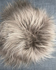 Luxury Icelandic sheepskin roundie seat cover in taupe, premium natural long fur, hypoallergenic, handcrafted, best-selling home decor by Wildash London at brixbailey.com