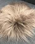 Luxury Icelandic sheepskin roundie seat cover in taupe, premium long fur, hypoallergenic, handcrafted, best-selling home decor by Wildash London at brixbailey.com
