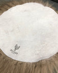 Luxury Icelandic sheepskin roundie seat cover in taupe, premium natural long fur, handcrafted hypoallergenic, best-selling home decor by Wildash London at brixbailey.com