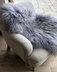 Premium Icelandic sheepskin rug in cool grey, long fur luxury throw, ethically sourced, sustainable, best-selling home decor by Wildash London at brixbailey.com