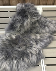 Luxury Icelandic long fur sheepskin rug in cool grey, premium ethical hide, stylish modern decor, best-selling sustainable throw by Wildash London at brixbailey.com