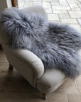 Luxury Icelandic long fur sheepskin rug in cool grey, premium handcrafted sustainable hide, stylish Nordic decor by Wildash London at brixbailey.com