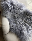 Luxury Icelandic long fur sheepskin rug in cool grey, premium handcrafted sustainable hide, stylish Nordic home decor by Wildash London at brixbailey.com
