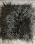 Luxury natural black Icelandic sheepskin seat cover, premium undyed long fur, handcrafted sustainable square pad 37cm by Wildash London at brixbailey.com