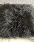 Luxury natural black Icelandic sheepskin seat cover, premium undyed fur, handcrafted, sustainable, hypoallergenic, machine washable by Wildash London at brixbailey.com
