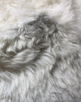 Premium Icelandic sheepskin square seat cover, 37cm, natural white with grey highlights, luxury handcrafted sheepskin, best-selling sustainable home decor by Wildash London at brixbailey.com
