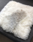 Premium Icelandic sheepskin square seat cover, 37cm, natural white with grey highlights, luxury handcrafted sheep fur, best-selling sustainable home decor by Wildash London at brixbailey.com