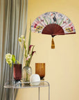 Floral Silk Fan with Toucan design and luxurious Gold tassel, part of the Mysa Collection