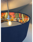 Navy velvet drum lampshade/ ceiling light shade with wonderland paper interior