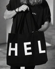 Premium handprinted black shopper bag, limited edition, organic cotton, recycled polyester, fair trade, made in Finland by WWOOLLFF CO. at brixbailey.com