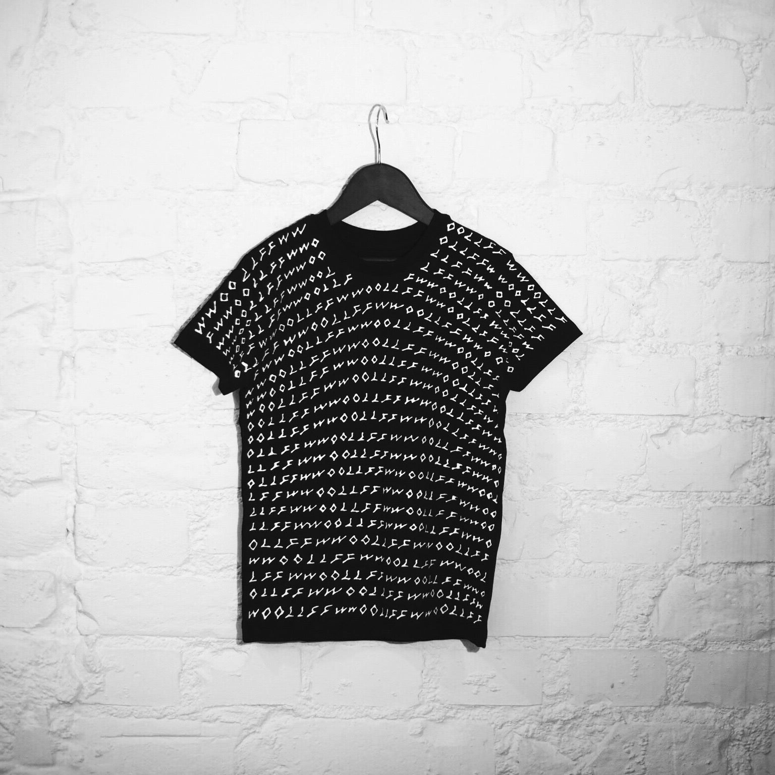 Limited edition unisex kids tee, handpainted premium organic cotton, stylish black graphic design, trending youth apparel by WWOOLLFF CO. at brixbailey.com