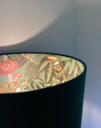 Green velvet wonderland drum lampshade, double sided lampshade with sage wonderland paper on interior