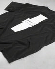 Premium handprinted oversized black tee, limited edition organic cotton unisex shirt, designed in Helsinki, fair trade certified by WWOOLLFF CO. at brixbailey.com