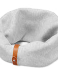 a soft grey dog neck warmer made from cozy cotton-polyester blend, shown in gentle morning light