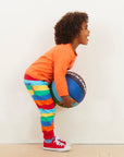 Premium striped organic cotton kids jogging pants, soft cozy fabric with stretch cuffs, trendy bright colors, best-selling comfy lounge wear by Toby Tiger at brixbailey.com