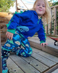 Premium Organic Cotton Dinosaur Print Joggers for Kids - Stylish Green Blue Gray Dino Pants with Contrast Pocket by Toby Tiger at brixbailey.com