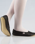 bold black leather gymnastics slippers with a secure rubber ridge and sole for confident performance