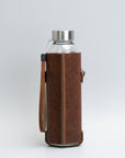 Leather water bottle holder with strap and glass bottle | OUTLET