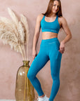 Turquoise High-Waisted Leggings with Pockets - Comfort & Style for Your Workout by Peachlabel at www.brixbailey.com