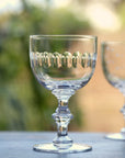 A Set Of Four Crystal Wine Goblets with Lens Design