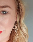 Leopard print lightning bolt earrings