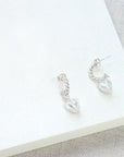 Luxury sterling silver heart charm hoops, Love Mi Amore, interchangeable charms, stylish twisted finish, vintage-inspired jewelry by Lezzeri at brixbailey.com