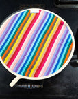 Premium rainbow chef pad for Aga range cooker, handmade heat-retaining hob cover in UK-woven organic cotton, stylish and protective by Maison Elhoria at brixbailey.com