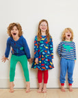Premium organic cotton long sleeve kids shirt with embroidered T-Rex applique, GOTS certified, snap buttons, dinosaur collection by Toby Tiger at brixbailey.com