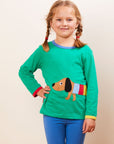 Premium organic cotton long sleeve green t-shirt with stylish dachshund applique, rainbow jacket, GOTS certified, soft and comfortable, sizes 6-24 months by Toby Tiger at brixbailey.com