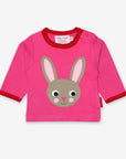 Premium Pink Organic Cotton Long Sleeve Baby Shirt with Bunny Applique and Surprise Back Detail by Toby Tiger at brixbailey.com