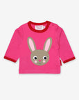 Premium Organic Cotton Baby Bunny Long-Sleeve Shirt with Contrast Hem and Surprise Back Detail, GOTS Certified, Eco-Friendly Dye by Toby Tiger at brixbailey.com