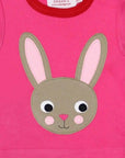 Premium Pink Organic Cotton Long-Sleeve Baby Shirt with Bunny Applique and Surprise Back Detail by Toby Tiger at brixbailey.com
