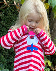 Vibrant Flower Power Pink Striped Organic Cotton Long Sleeve Shirt with Retro Floral Applique and Interactive Ladybug Flap by Toby Tiger at brixbailey.com
