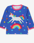 Luxury baby blue long sleeve shirt with unicorn and rainbow applique, premium organic cotton, soft GOTS certified fabric by Toby Tiger at brixbailey.com