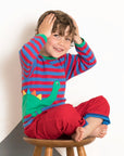 happy striped dino long sleeve shirt with front and back applique, soft certified organic cotton, snap buttons at neck, premium kids clothing by Toby Tiger at brixbailey.com