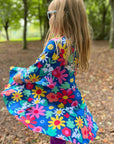 Premium organic cotton floral print skater dress, stylish dark blue with snowdaisies tulips, long sleeve luxury kids dress by Toby Tiger at brixbailey.com