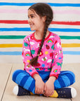 Premium long-sleeve baby shirt with colorful dinosaur unicorn elephant print, soft organic cotton, snap neck closure, Toby Tiger design by Toby Tiger at brixbailey.com