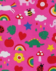 Premium long-sleeve baby shirt with colorful dinosaur unicorn elephant print, soft organic cotton, snap buttons, sustainable GOTS certified by Toby Tiger at brixbailey.com