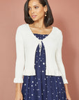 Yumi Ivory Tie Up Ribbed Cardigan With Frill Hem