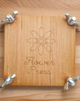 Premium wooden flower press and scented candle gift set for gardeners, lavender or tomato vine fragrance, luxury botanical preservation kit by Ralph's Orchard at brixbailey.com