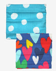Luxury Multicolor Heart Print Blue and Pink Organic Muslin Swaddle Blanket for Babies by Toby Tiger at brixbailey.com