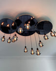 Modern Waves: Stainless Steel Mirrored Chandelier